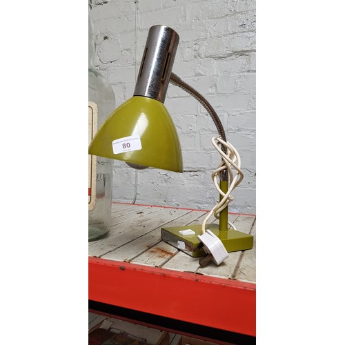 80 - A mustard colour anglepoise lamp.