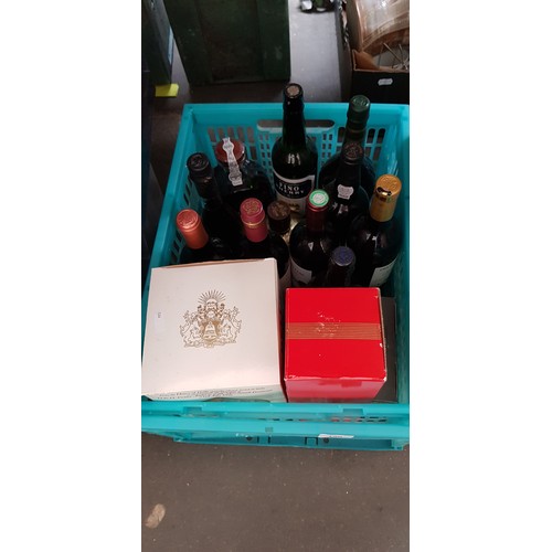 150 - A box of alcoholic beverages to includde VSOP brandy, a sealed Bell's decanter, sherry, port and win... 