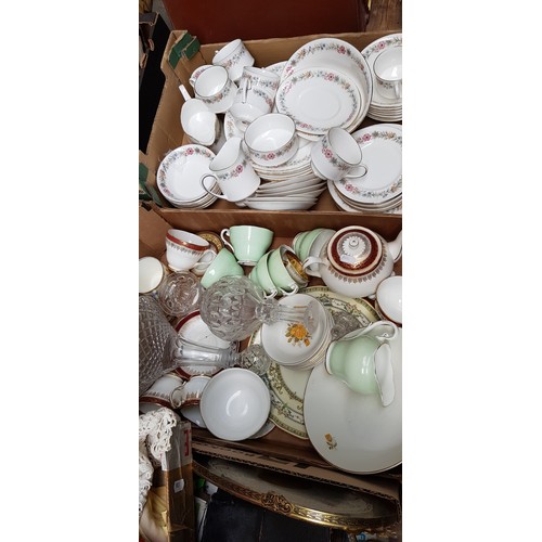 139 - Two boxes of ceramics, saucers, cups, etc together with 2 decanters.