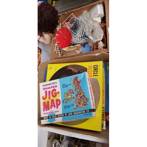 147 - A box of games and a box of dolls house furniture, a vintage bagatelle, etc.