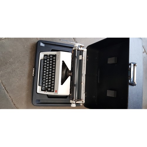 172 - An Olympia portable typewriter, in case.