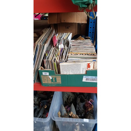 187 - A large quantity of 45s and a small selection of LPs.