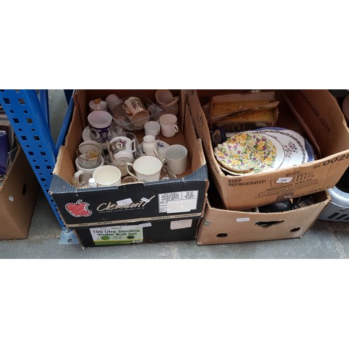 209 - Four boxes of mixed items including china, ceramics, tins, etc.