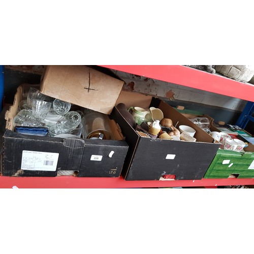 226 - 2 boxes of glassware and 2 boxes of pottery, etc.