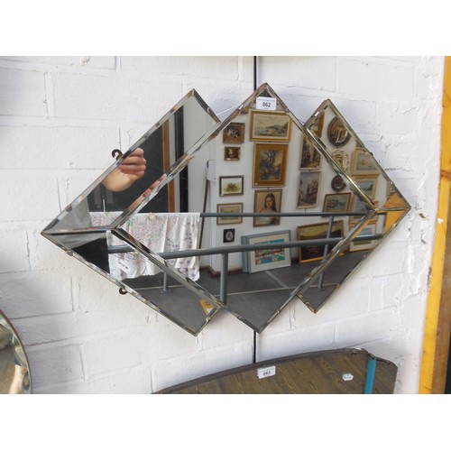 862 - A 1930s Art Deco frameless wall mirror, geometric design, 78.5cm x 50.5cm.