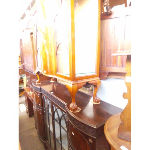 973 - A 1930s walnut display cabinet, together with an early 20th century mahogany display cabinet.