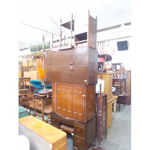 987 - A 1930s oak bedroom suite comprising dressing table, stool, tallboy and bedside cabinet together wit... 