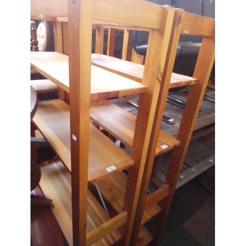 924 - Three sets of pine shelves and a pine bookcase.