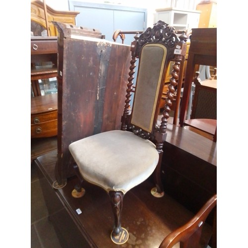 915 - A Victorian carved mahogany bedroom chair.