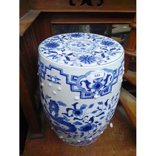 944 - A Chinese blue and white ceramic garden stool.