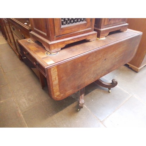 930 - A 19th century mahogany pedestal Pembroke table.