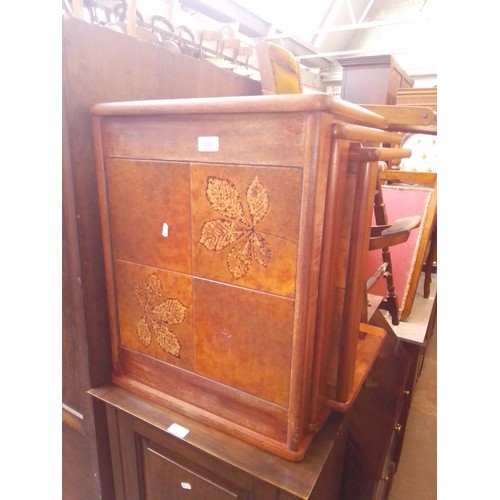 939 - A mid 20th century teak tile top nest of tables.