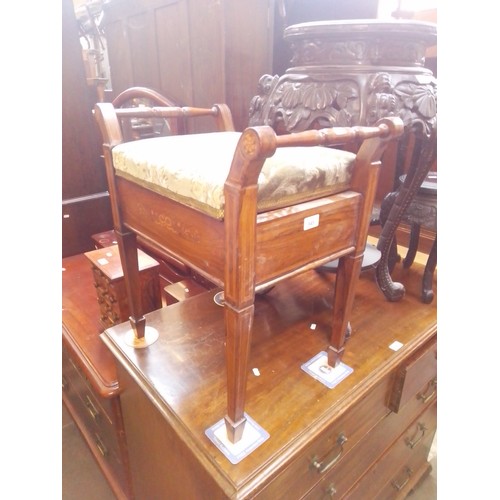 945 - An Edwardian inlaid rosewood piano stool.