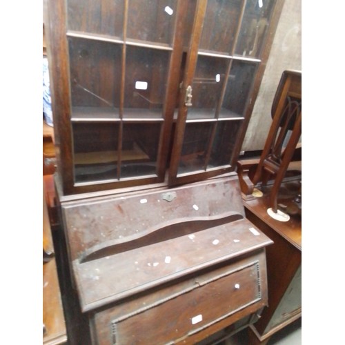 959 - Two early 20th century oak bureau bookcases.