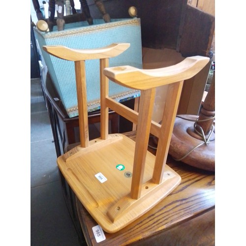 984 - An Ercol light elm occasional table.