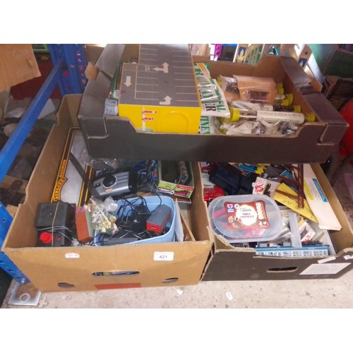 421 - 3 boxes of model railway parts & accessories to include controllers, electronic parts, A Hornby batt... 