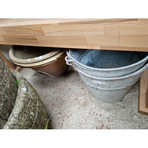 277 - Two large proving bowls together with two galvanised buckets