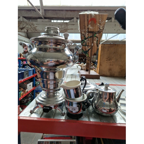 278 - A five piece tea urn set.