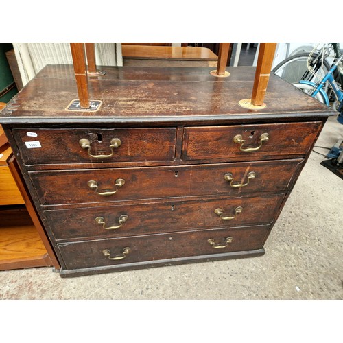 1001 - A Geoge III oak chest of drawers, height 84cm, width 102cm, depth 53.5cm.