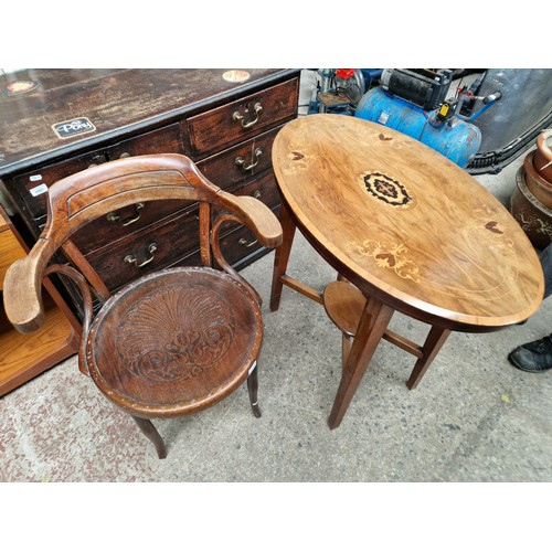 1002 - An inlayed walnut occassional table & a early 20th century bentwood armchair.