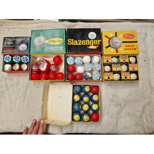 43 - Vintage golf balls and clubs.