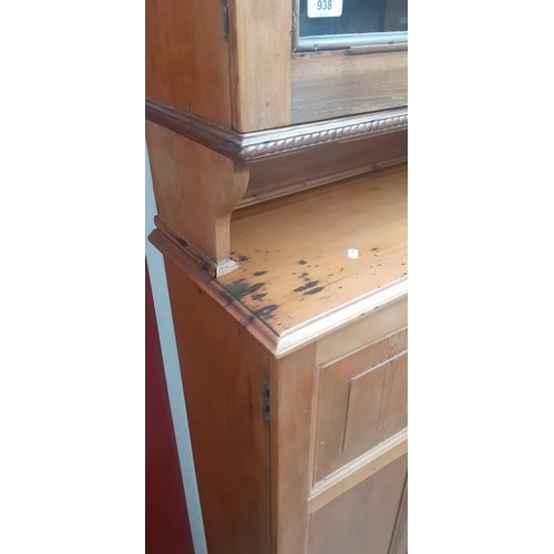 938 - A late Victorian pine secretaire cabinet bookcase, the interior fitted with drawers.