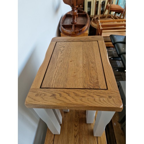 916 - A painted oak nest of tables and TV stand.