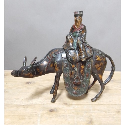 224 - A Chinese bronze incense burner, modelled as a scholar on horse back, gilt and lacquer decoration, 1... 