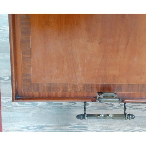 220 - A rosewood inlaid and satin wood tray table by Osterley, twin brass handles, height 60cm.