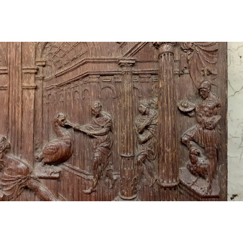 227 - A carved oak panel depicting Bel and the Dragon, from the book of Daniel, 27.5cm x 31.5cm, possibly ... 