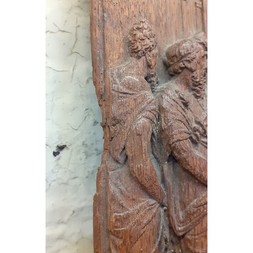 227 - A carved oak panel depicting Bel and the Dragon, from the book of Daniel, 27.5cm x 31.5cm, possibly ... 