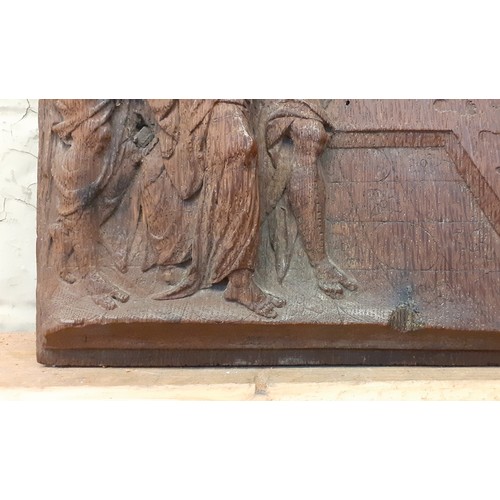 227 - A carved oak panel depicting Bel and the Dragon, from the book of Daniel, 27.5cm x 31.5cm, possibly ... 