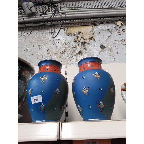 695 - A pair of Mettlach vases, stamped 2868 to base