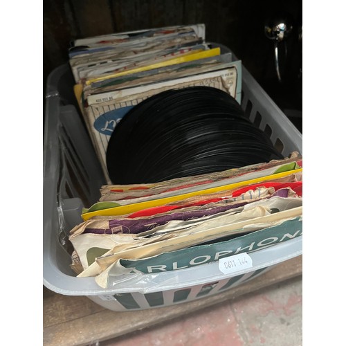 76 - A box of 45s single records.