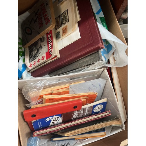 71 - A box of stamps, etc together with some military booklets.