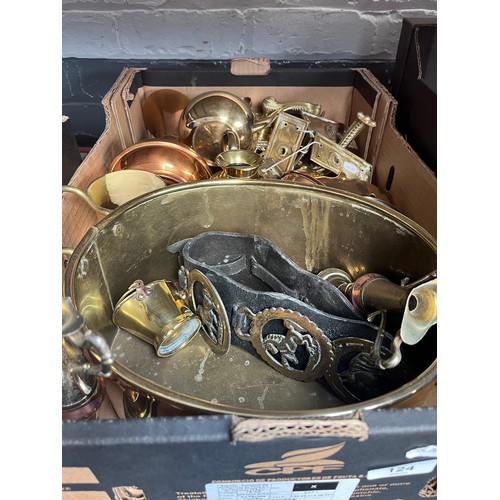 124 - A box of brass and copper wares