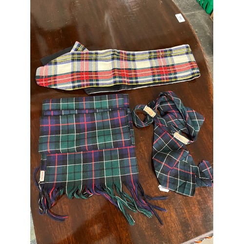 179 - A dress kilt, a jacket and other related items - dirk, sporran, belt, etc.