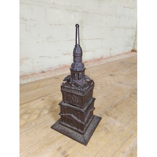 90 - A Tower Bank cast metal money bank, height 23cm.