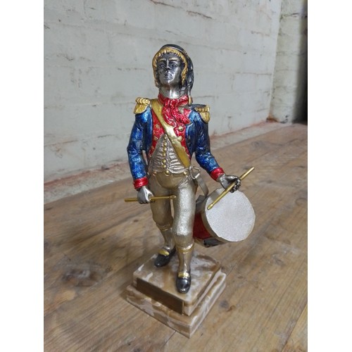 93 - A cast metal figure entitled Drummer France 1779, silver, gilt and enamel decoration, onyx base, lim... 