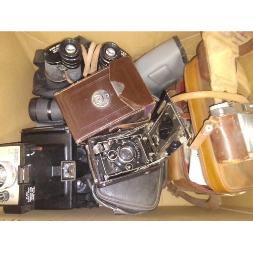 224 - A box of assorted cameras including a Compur Contessa Nettel, various binoculars etc.