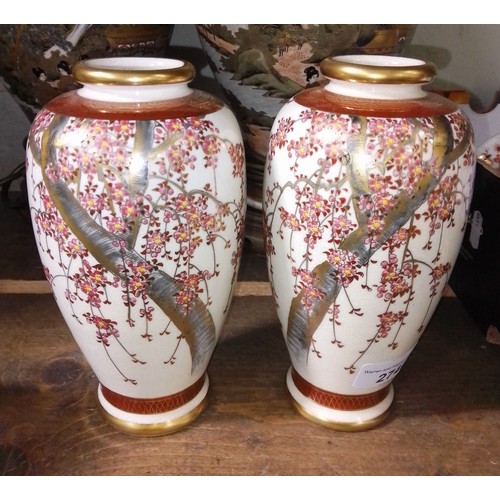 274 - A pair of Japanese Satsuma vases, height 18.5cm.