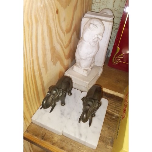 288 - A pair of spelter elephants on marble bases and a pair of plaster owl bookends, length 13cm & 11cm r... 