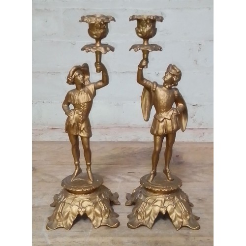 295 - A pair of gilt painted cast metal candlesticks, height 33cm.