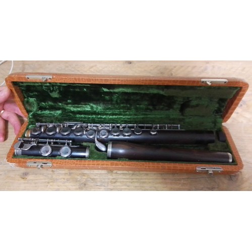 326 - A silver plated hardwood flute by and stamped Philipp Hammig, Markneukirchen, no 12789, in case.