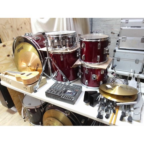 323 - A Hohner drum kit comprising bass drum, two tom toms and a floor tom, snare, two cymbals, hi-hat, wi... 