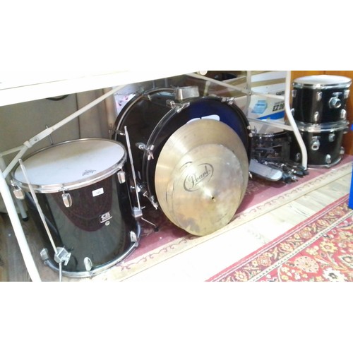 325 - A CB drum kit comprising bass drum, two tom toms and floor tom, two cymbals, hi-hat, pedals and stan... 