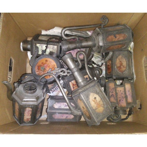 379 - A box of Chinese pewter tea ware with decorated panels.