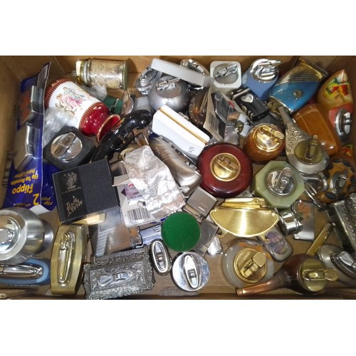 371 - A quantity of vintage lighters.