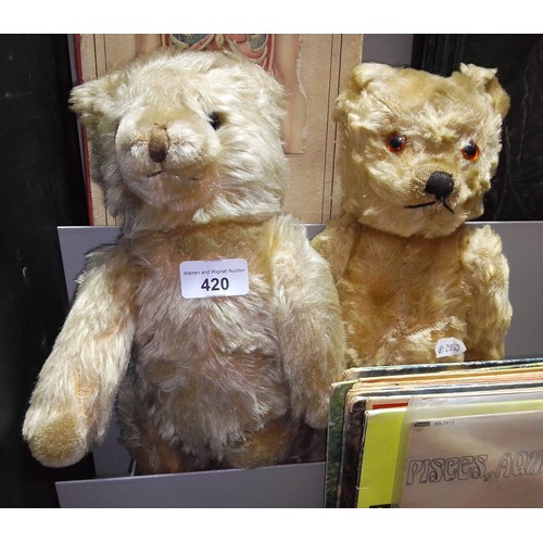 420 - Two early 20th century teddy bears, both with articulated limbs.