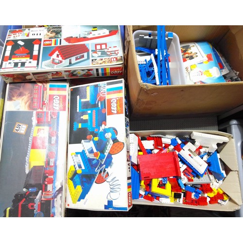 423 - Two boxes of 70s - 80s Lego together with 3 product boxes.